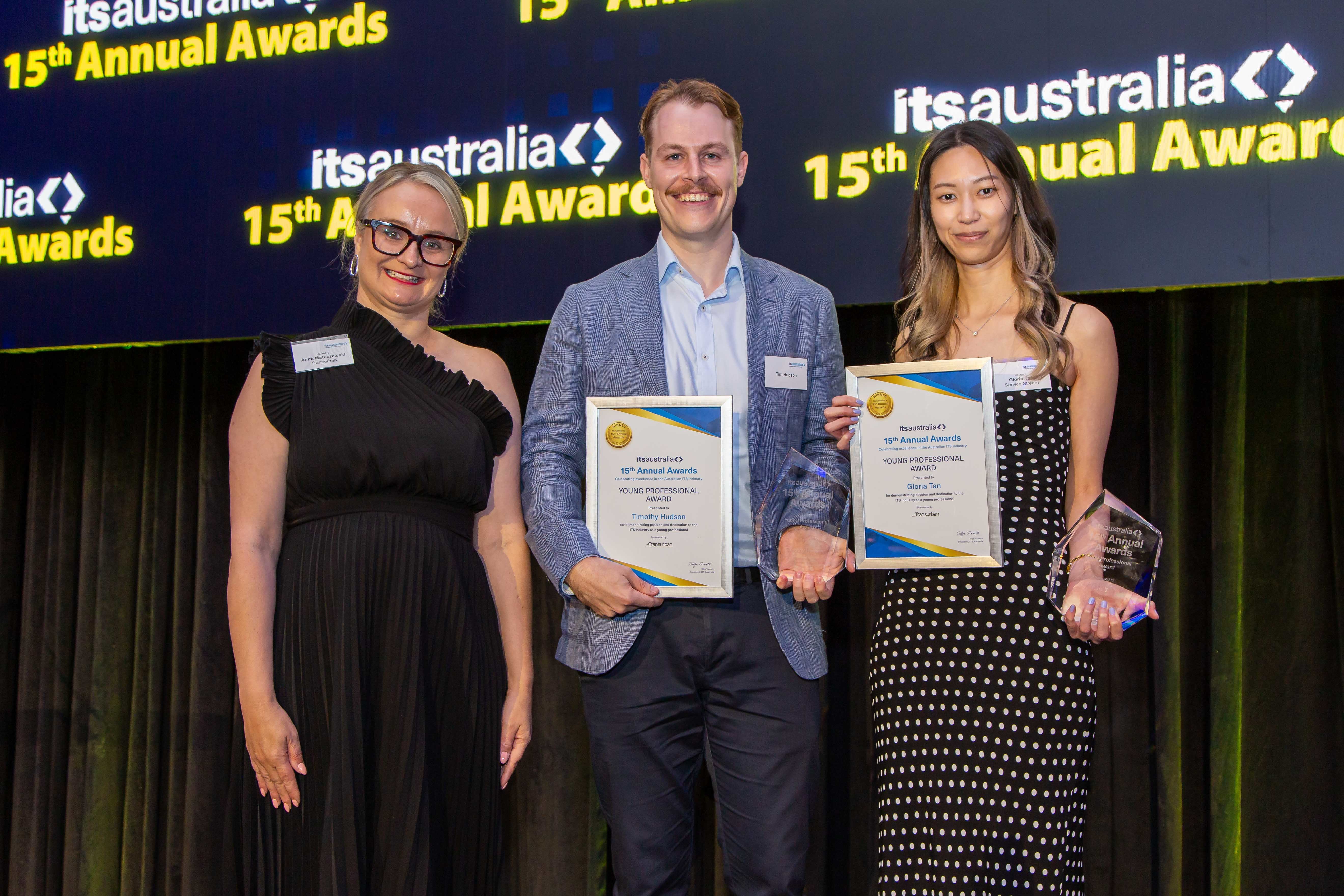 Young Professional Award Joint Winners Gloria Tan, Service Stream and Timothy Hudson, Transurban with presenter Anita Matuszewski